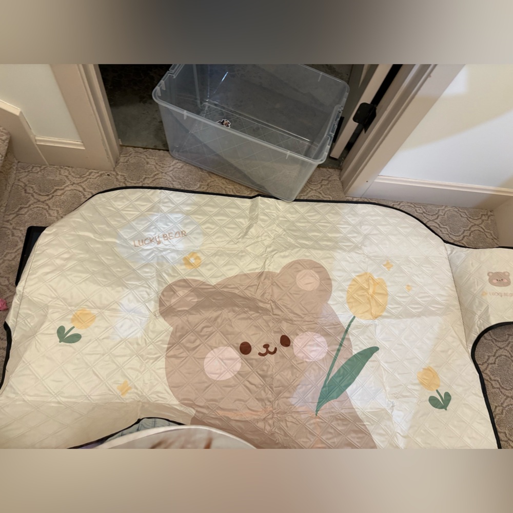 Cream and Brown car front window cover